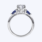 Anastasia Round Sapphire and Diamond Engagement Ring